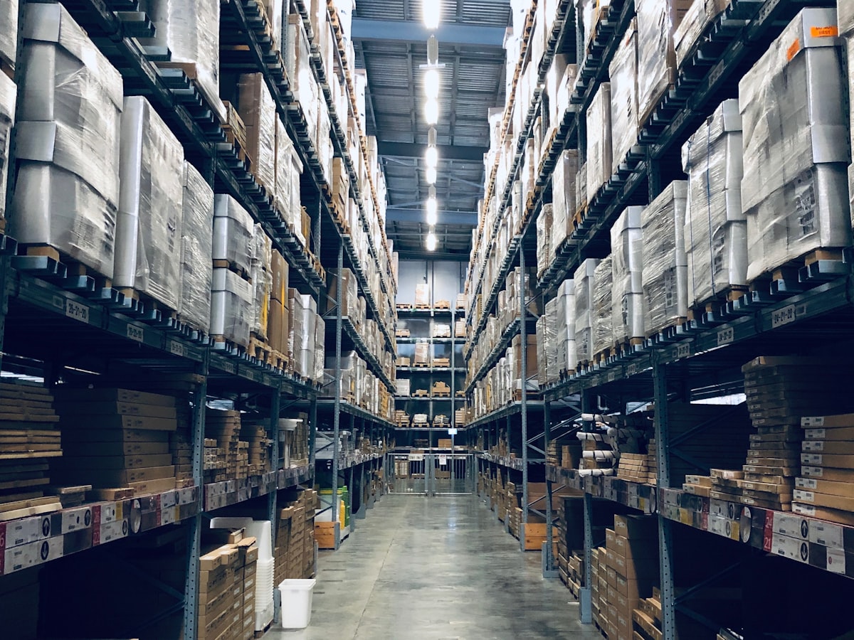 Warehouse racking stacked with stock
